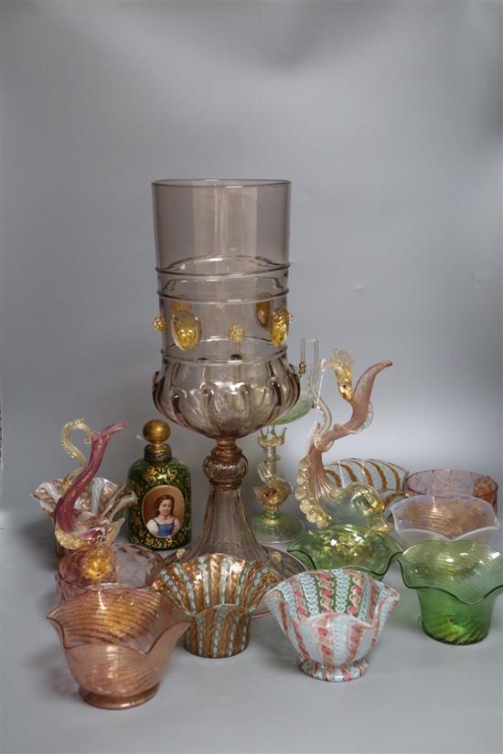 A Bohemian green and gilt glass scent bottle, a large German glass chalice form vase with gilt mask prunts and other glassware,